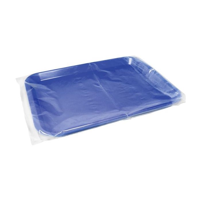 Clear plastic instrument tray cover on purple instrument tray 